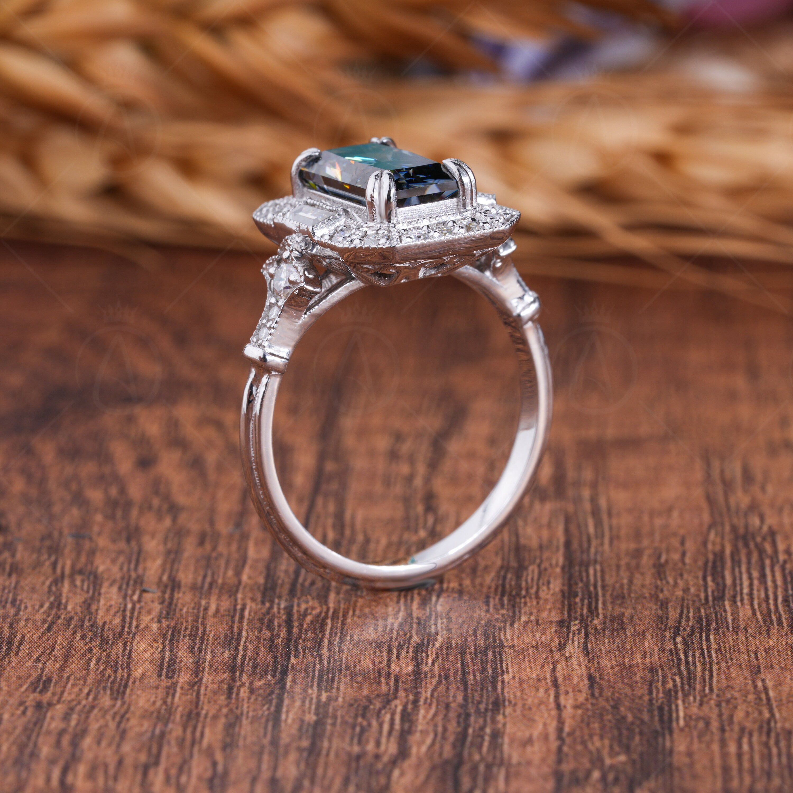 Elongated gray radiant cut Edwardian engagement ring with intricate vintage detailing. A timeless, elegant design perfect for romantic proposals.